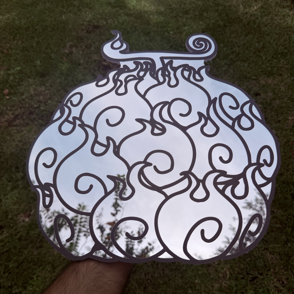 Flame-Flame Fruit Mirror, One Piece wall mirror, held in hand for scale