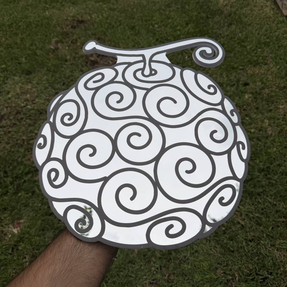 Gum-Gum Fruit Mirror, One Piece wall mirror, held in hand for scale