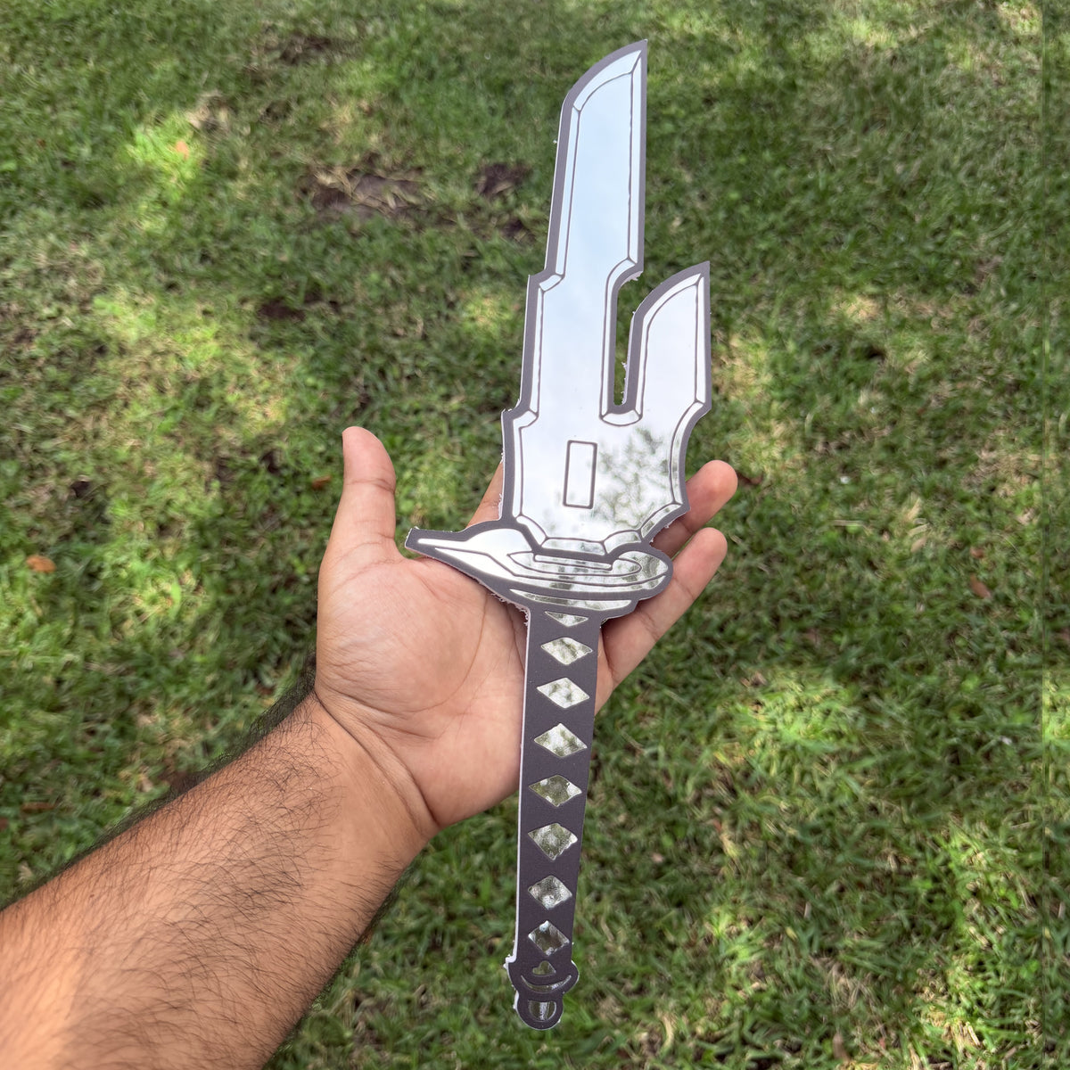Sorcerer Killer Blade Mirror, Jujutsu Kaisen wall mirror, held in hand for scale