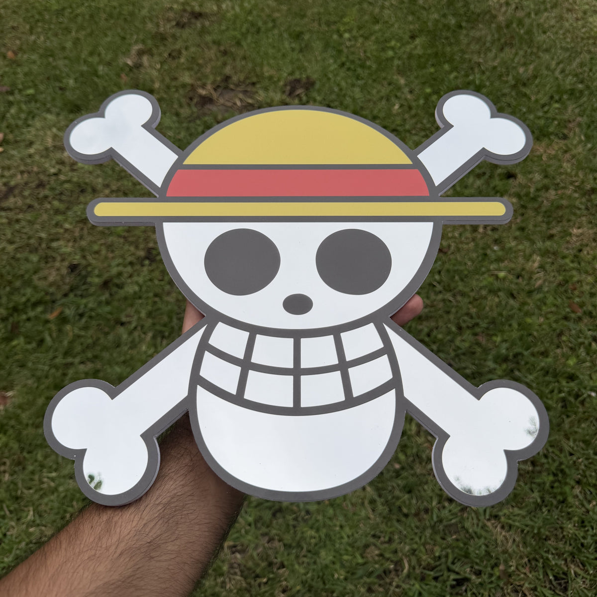 Straw Hat Flag Mirror, One Piece wall mirror, held in hand for scale