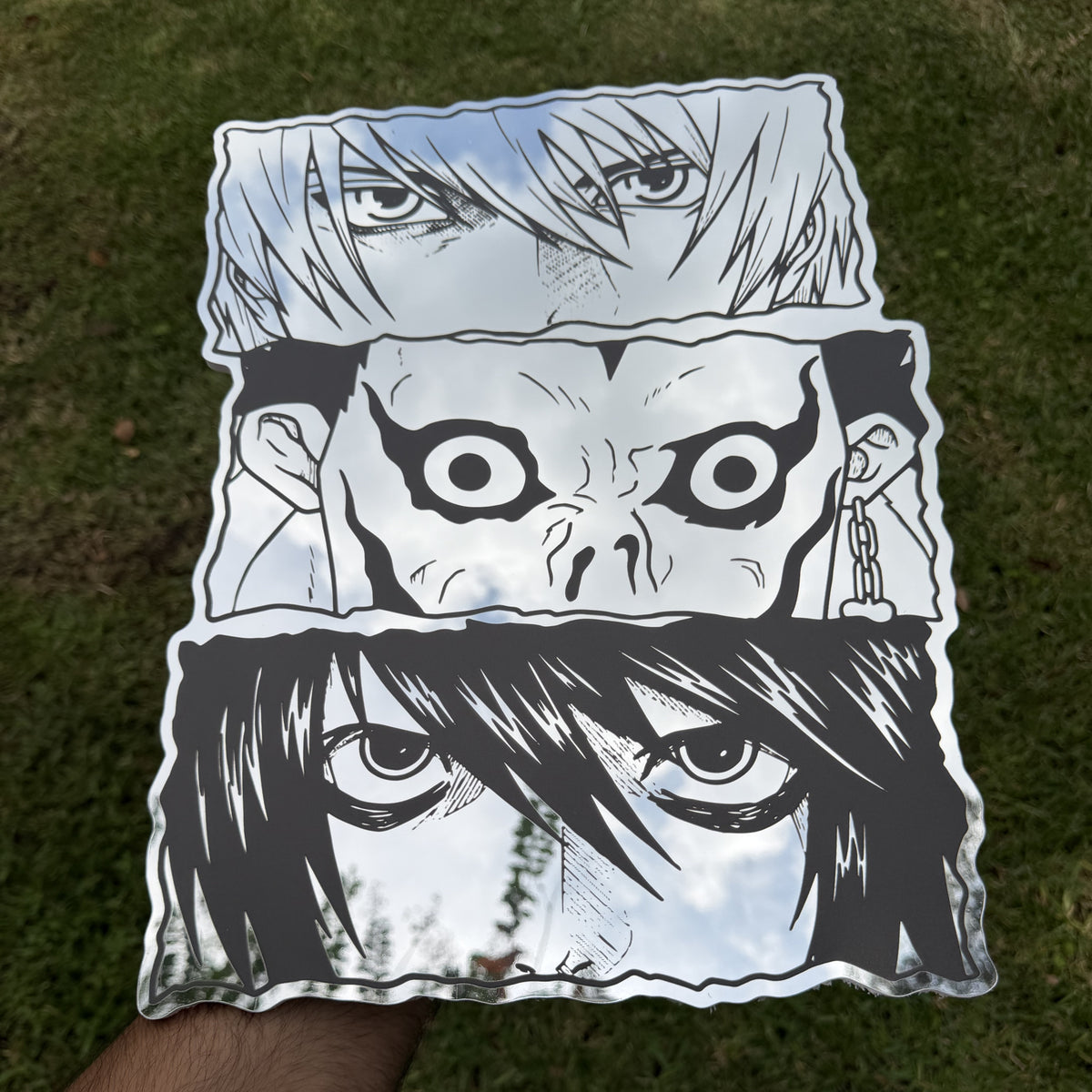 Three Gazes Mirror, Death Note wall mirror, held in hand for scale