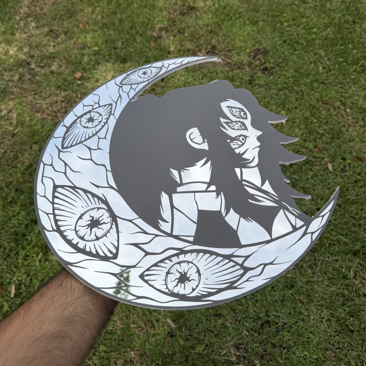 Upper Moon One Mirror, Demon Slayer wall mirror, held in hand for scale